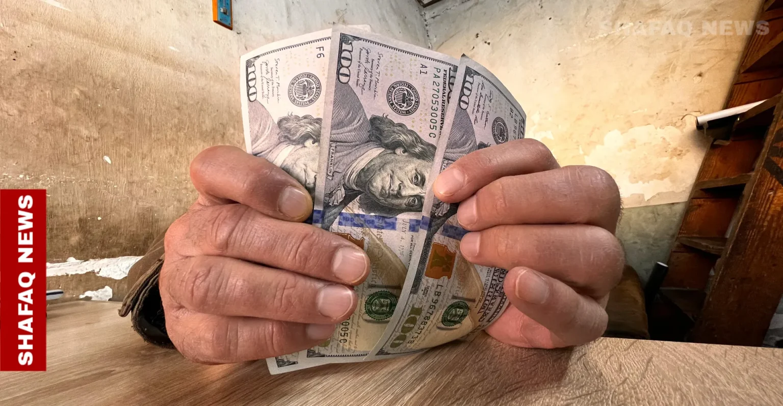 أسعار صرف الدولار مع الإغلاق في بغداد واربيل